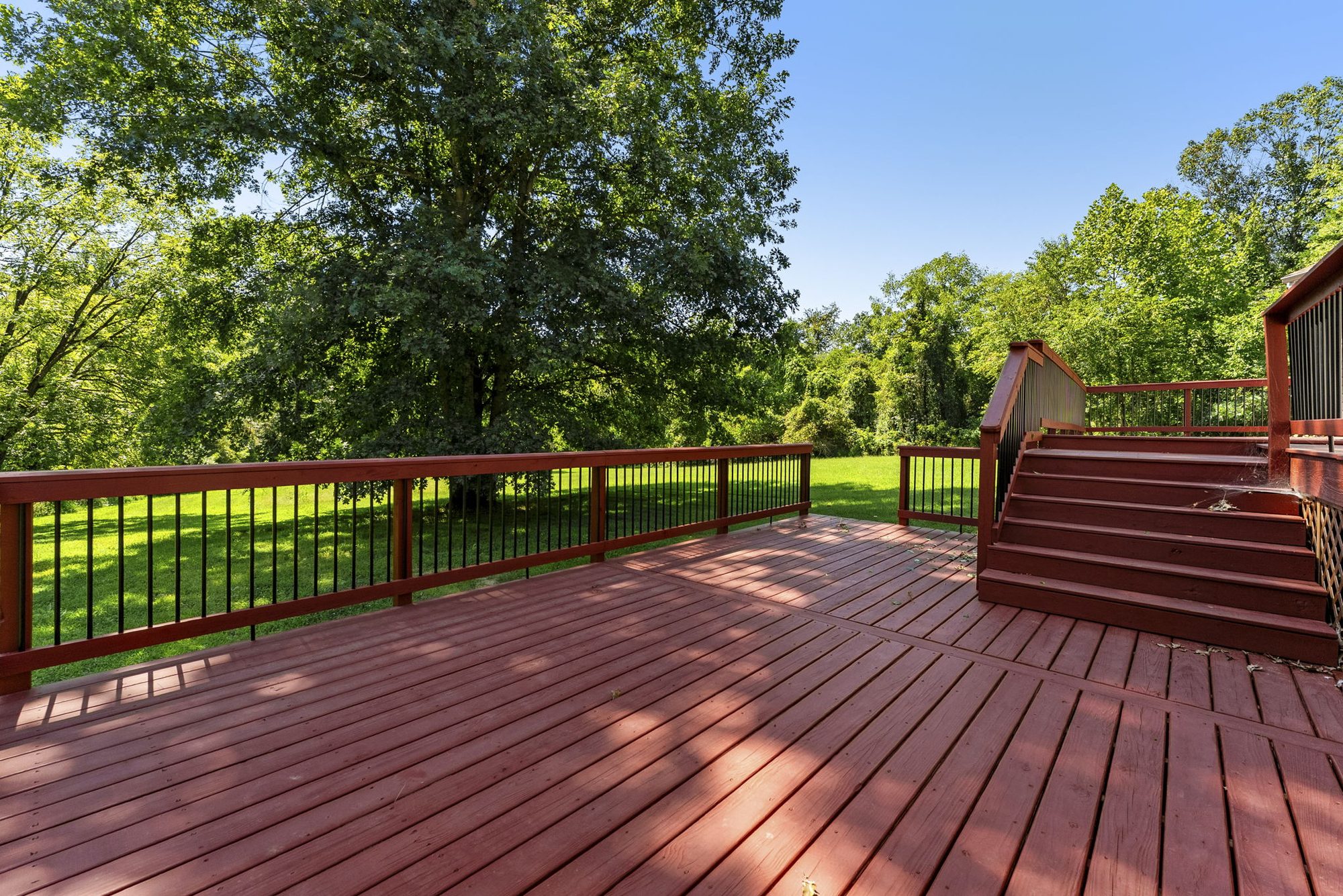 Large rear deck overlooking the private back yard